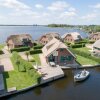 Отель Thatched Villa With a Dishwasher at Giethoorn, фото 12