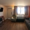 Отель Executive Inn and Suites в Нептун-Сити