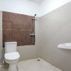 Отель OYO 91266 Markoni 18 Guest House, фото 7