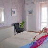 Отель Holiday Apartment Graziella - max 6 Guests, Close to Beaches and Clubs, фото 5