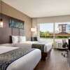 Отель La Quinta Inn & Suites by Wyndham Orlando - IDrive Theme Parks, фото 7