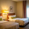 Отель Candlewood Suites Airport, an IHG Hotel, фото 4