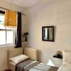 Отель Studio Flat with Shared Rooftop Terrace, фото 6