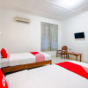 Отель OYO 1602 Trim Tiga Hotel, фото 7