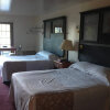 Отель Seasons Inn & Suites, фото 4