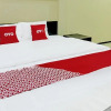 Отель OYO 92001 Unram Guest House, фото 20