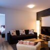 Отель TITLIS Resort Wohnung 303 в Энгельберге