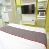 Отель Super OYO Capital O 93910 Asia Rooms @ Green Lake View Ciputat, фото 35