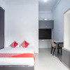 Отель OYO 93476 Owo Guest House Syariah, фото 7