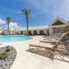 Отель Palmilla Resort Paradise W/ Pool, Beach & Golf 3 Bedroom Townhouse в Порт-Аранзасе