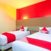 Отель Tiga Dara Kampung Wisata Hotel & Resor by OYO Rooms, фото 31
