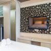 Отель Warm Studio Apartment At Tamansari Papilio, фото 3