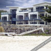 Отель Mollymook Beachfront Luxury Apartment в Моллимуке