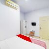 Отель OYO 91283 Sg Premium Guest House, фото 17