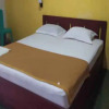 Отель OYO 90490 Hotel Nyi Rindang, фото 8