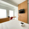 Отель Enjoy Living Studio Room At Patraland Urbano Apartment, фото 1