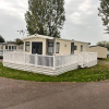 Отель Premium 2 bed Caravan Sleeps 6 With Huge Decking, фото 1