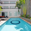 Отель Stylish 2BR a few steps to the beach with pools by Happy Address, фото 15
