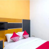 Отель Super OYO 617 Sukaraja Residence Syariah, фото 3
