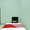 Отель OYO 91803 Gita Graha Guest House Syariah, фото 17