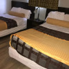 Отель Belmont Inn And Suites, фото 4