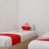 Отель OYO 1074 Homestay Rumah Puti, фото 4