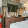 Отель Warm & Cozy Studio At Signature Park Grande Apartment, фото 11