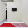 Отель OYO 91803 Gita Graha Guest House Syariah, фото 9