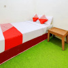 Отель OYO 90725 Zeevanna Guest House Syariah, фото 7
