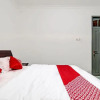 Отель OYO 91092 Rahma Garden Guest House, фото 17