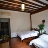Отель Lijiang Ancient Town International Youth Hostel, фото 4