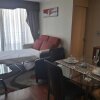 Отель Miraflores Apartment в Сантьяго