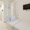 Отель Cozy Living Studio Room At Sky House Bsd Apartment, фото 2