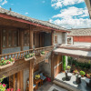 Отель Lijiang Heluju Inn, фото 1
