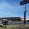 Отель Travelers Inn and Suites, фото 1