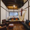 Отель Couch Potato Hostel в Мацумоте