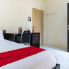 Отель RedDoorz Syariah near Jalan A Yani KM 8 Citraland, фото 4