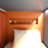 Отель Dream Chaser Boutique Capsule Hotel, фото 2