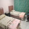 Отель OYO 93292 Raudhatul Husna Homestay Syariah, фото 12