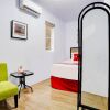 Отель OYO 90237 Ar 20 Guest House Syariah, фото 14