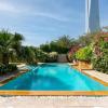 Отель Dubai Marina Villa up 20 guest huge Private Pool, фото 1