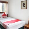Отель OYO 154 Griya Patria Guest House, фото 7