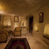 Отель Kayakapi Premium Caves - Cappadocia, фото 15