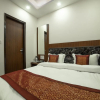 Отель OYO 14136 hotel toto international, фото 4