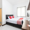 Отель OYO 1598 Feby Inn Near RS Gandaria, фото 26