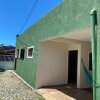 Отель Casa aconchegante à 400m da Praia da Tartaruga - Ar condicionado - WIFI 450MB - Netflix - Cozinha Co в Риу-дас-Острасе