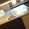 Отель Bridgepointe Inn & Suites, фото 22