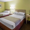 Отель Econo Lodge Inn & Suites Maingate Central, фото 7