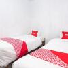 Отель OYO 1765 Herman Homestay, фото 10