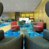 Отель Radisson Blu Hotel Apartment Dubai Silicon Oasis, фото 18